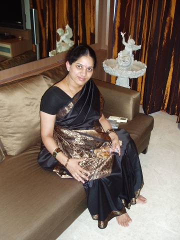 Mummy enjoying some apams..